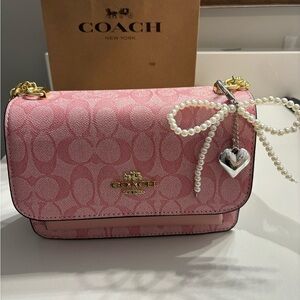 Coach Pink Crossbody Bag with Pearl and Heart Charm